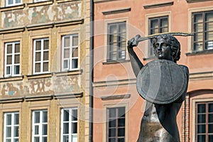 The Mermaid of Warsaw, monument of Syrena, symbol of Warsaw at Old Town Market Square, Poland photo